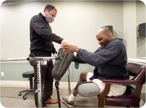 Blatchford prosthetist helping a patient